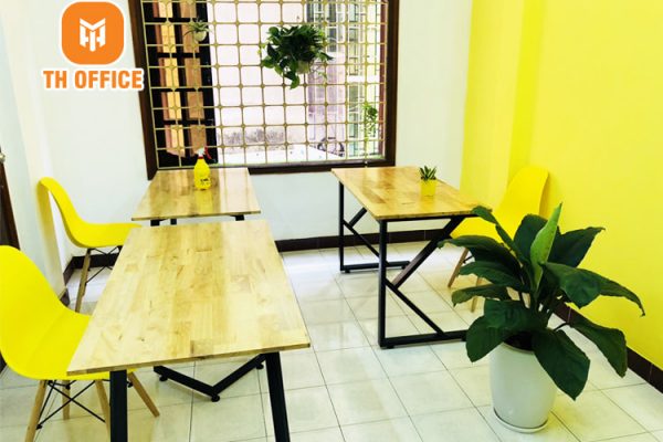 http://Văn%20phòng%20được%20trang%20trí%20tông%20màu%20vàng%20năng%20động%20tại%20tòa%20nhà%20TH%20Office%20Tower%20số%202/231%20Chùa%20Bộc